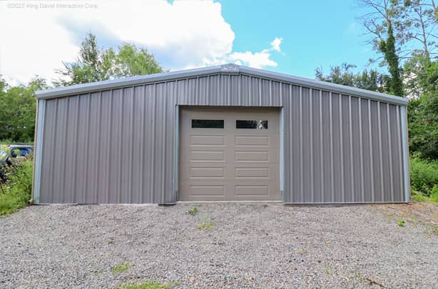 garage with gray wall panels